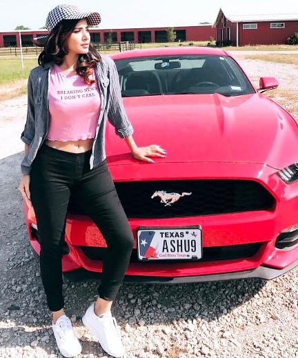 Ashu Reddy with Mustang Car